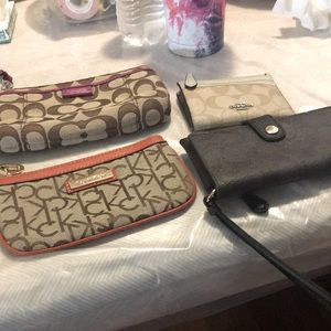 Like new coach and Calvin Klein wristlet